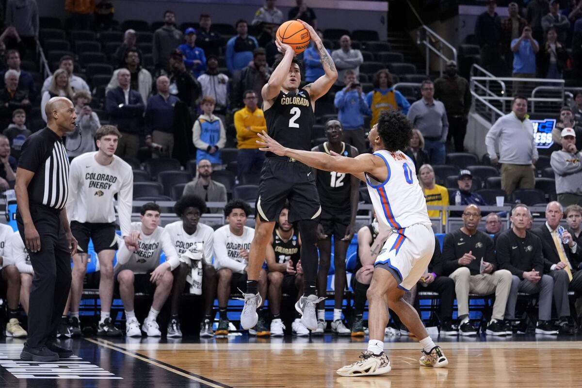 KJ Simpson s late jumper pushes Colorado past Florida 102 100 in